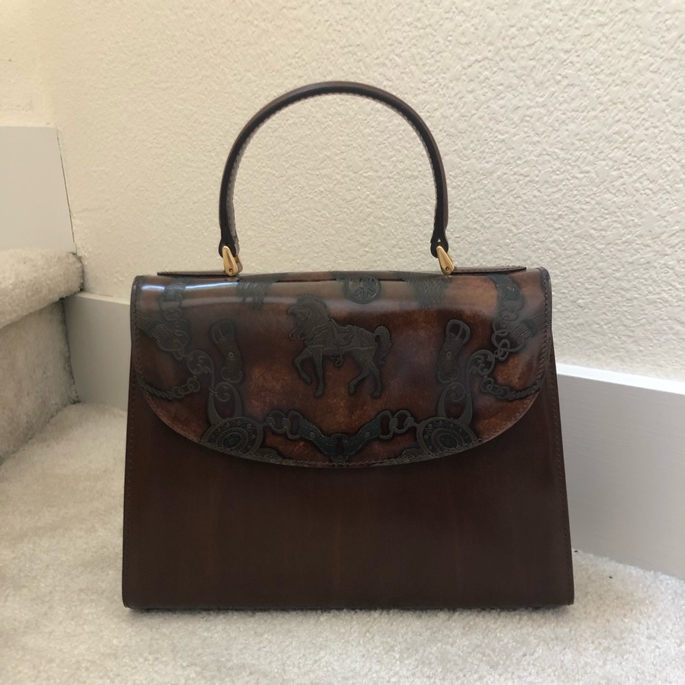 Brand new Italian bag 8 1/2 x 10 inch carry around wrist or grasp by hand.
